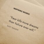 close up shot of inspiring words on a brown paper